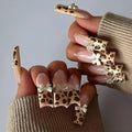 Leopard print butterfly nail art stickers in WM296 colour for decorative manicure enhancement