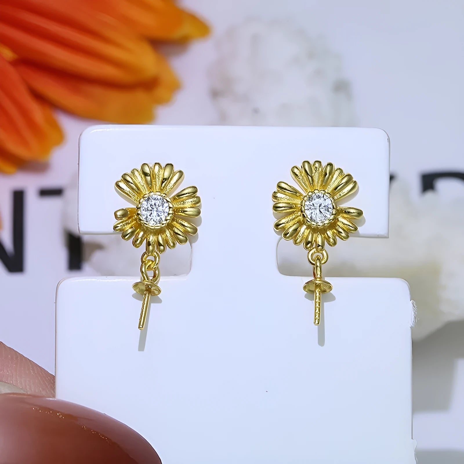 A pair of baroque-style flower earring frames in S925 sterling silver, shown in gold and silver colour options.