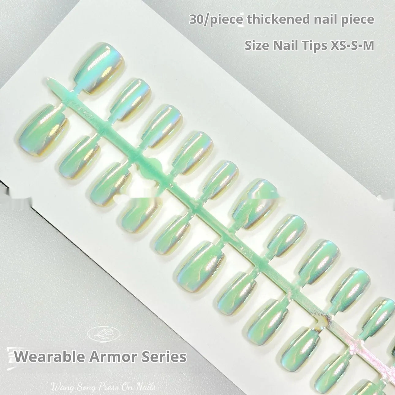 Set of electroplated Cat's Eye false nails in short ladder sizes showing Aurora and solid colour designs.
