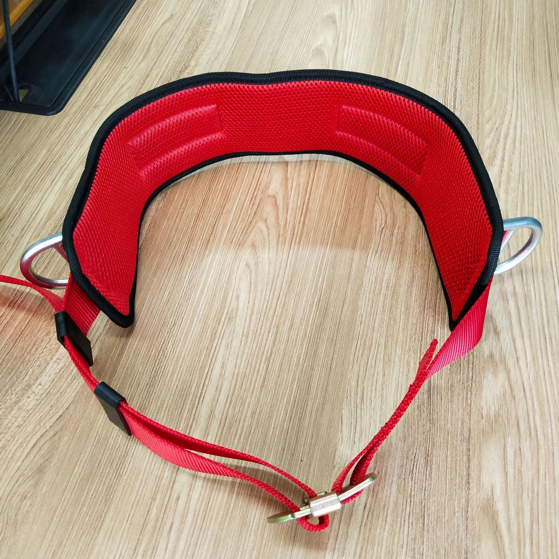 Red electrician safety belt with chest strap and lanyard for climbing and power engineering