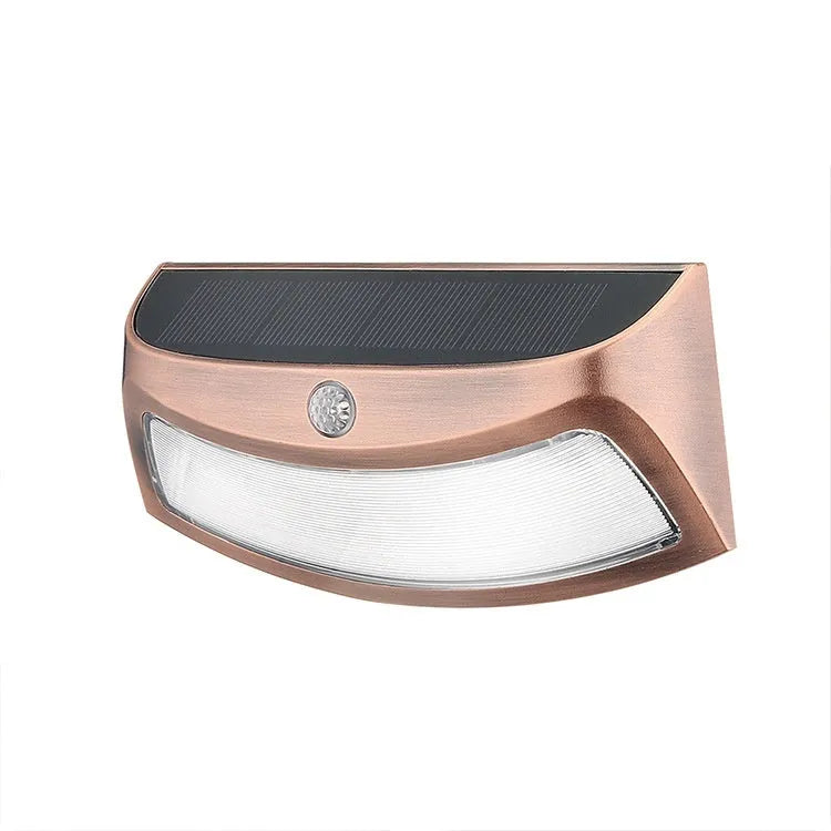 Solar powered outdoor wall lamp with smiling face design for garden and courtyard lighting