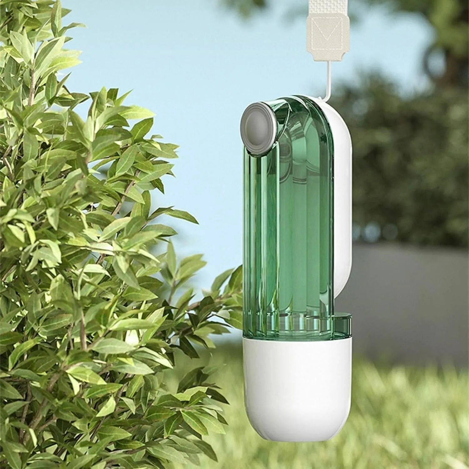 Beige and green foldable dog water bottle with food container, 21.5cm tall with leak-proof design