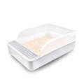 White semi-enclosed cat litter box size S made of PP plastic on a clean floor