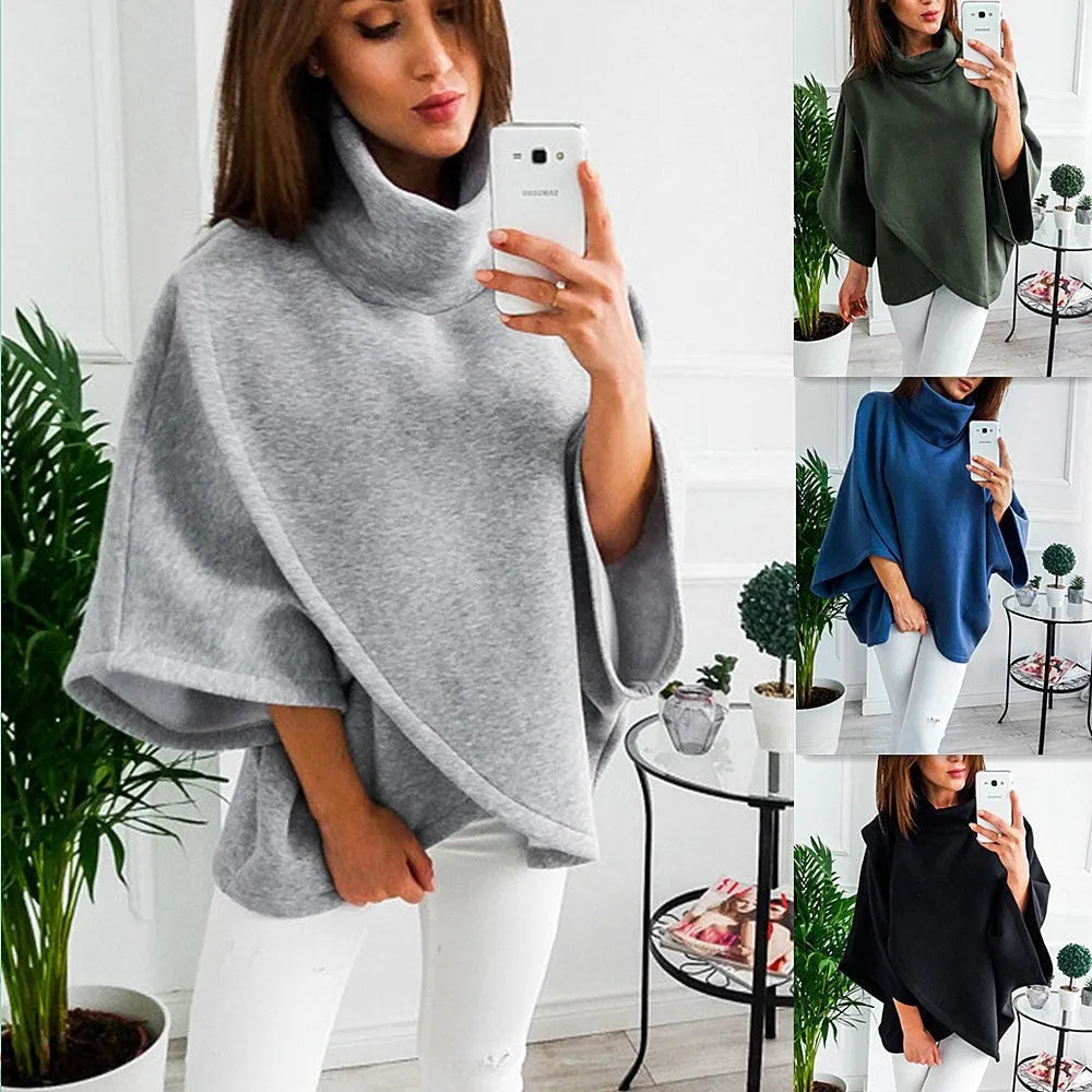 Women's longline batwing sleeve cardigan in a faux two-piece style with stitching detail.