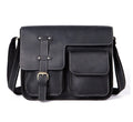 Vintage brown leather messenger bag with crossbody strap and front flap closure
