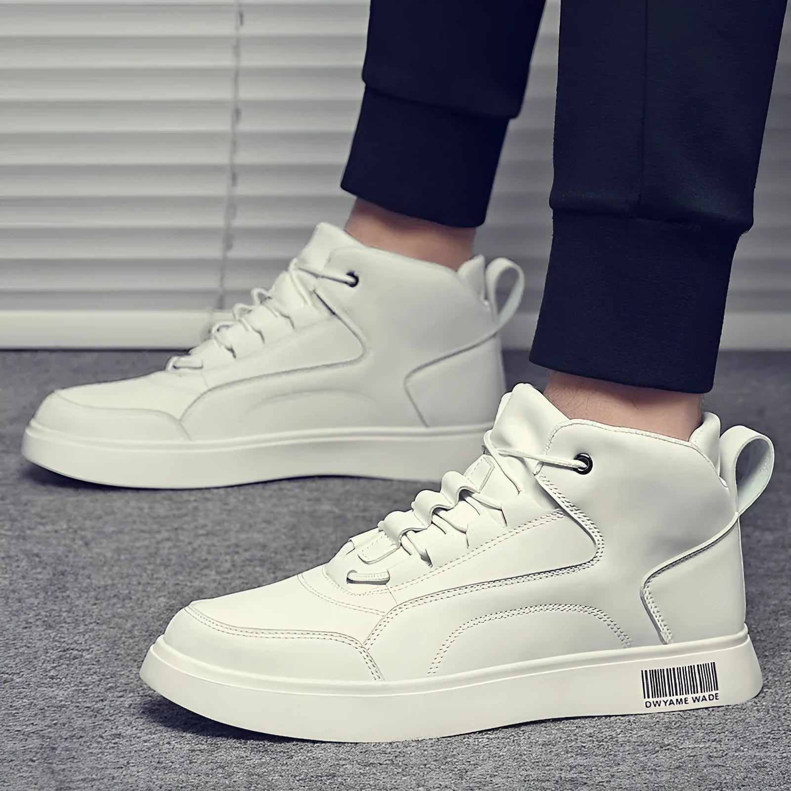 Men's white mid-top casual board shoes with a round toe and rubber sole.