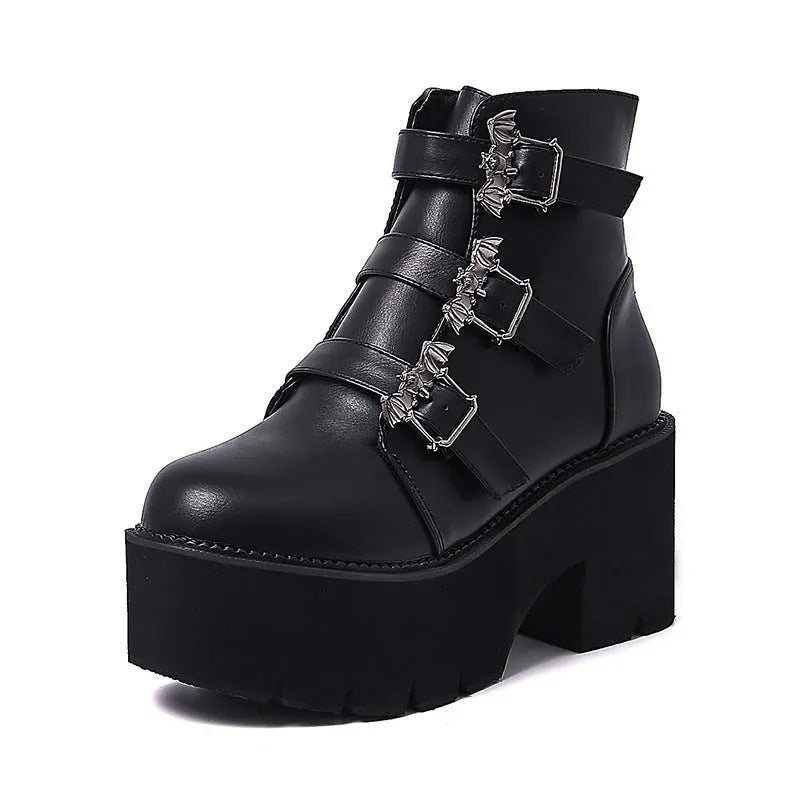 Black women's punk Martin boots with bat buckle, thick heel, and side zipper.