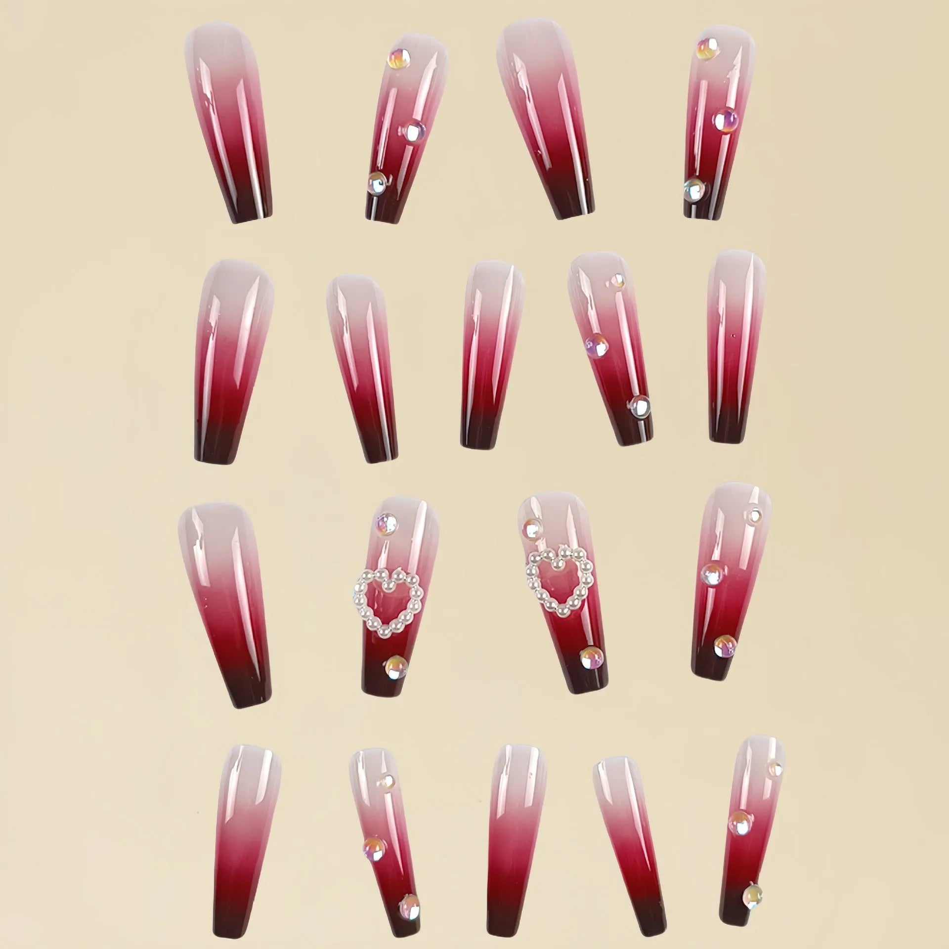 Wine red gradient fake nail tips with pearl heart decoration and plaid pattern in long ballet length style.