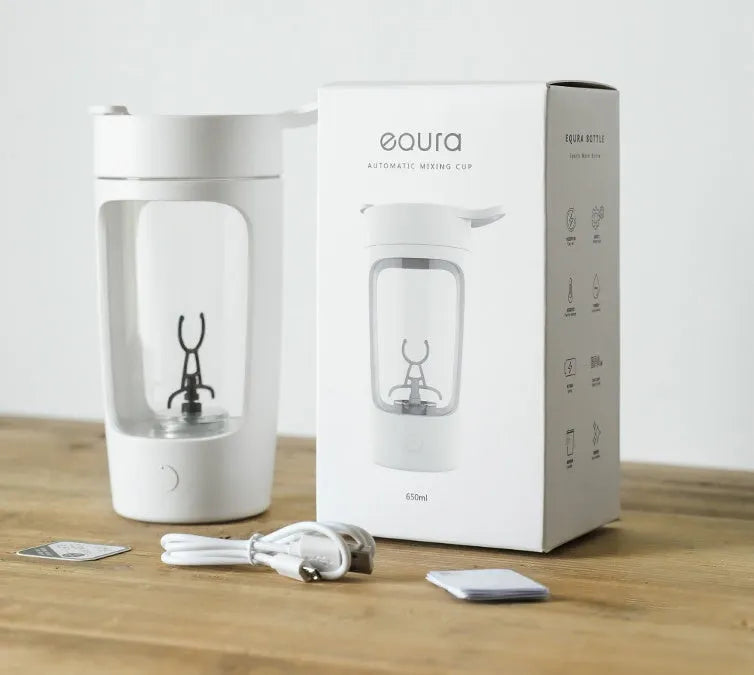 Portable automatic juice blender in black, blue, pink, or white colours showing 650ml capacity markings