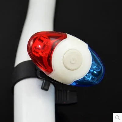 Red and blue LED bicycle tail light with an adjustable mounting base.