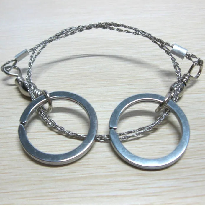 Outdoor survival wire saw with stainless steel blade, pull rings, and approximately 55cm cutting length
