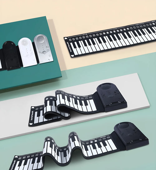 49 key portable folding electronic keyboard in pearl white with silicone keyboard surface and built-in speaker