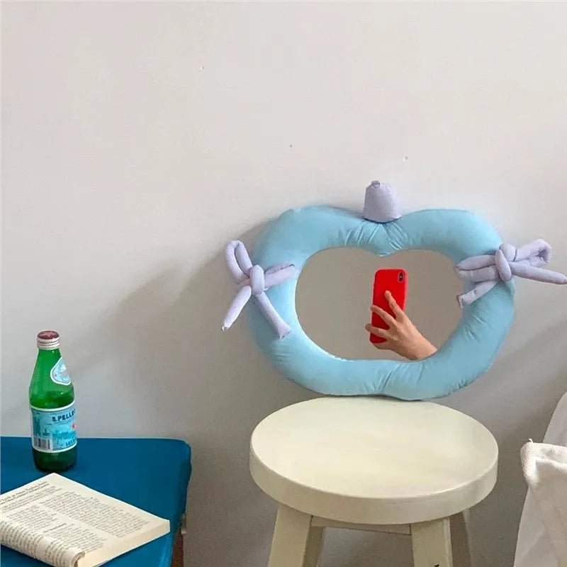 INS Korean-style cotton-filled fabric pillow wall mirror in Apple colour with aluminium lens