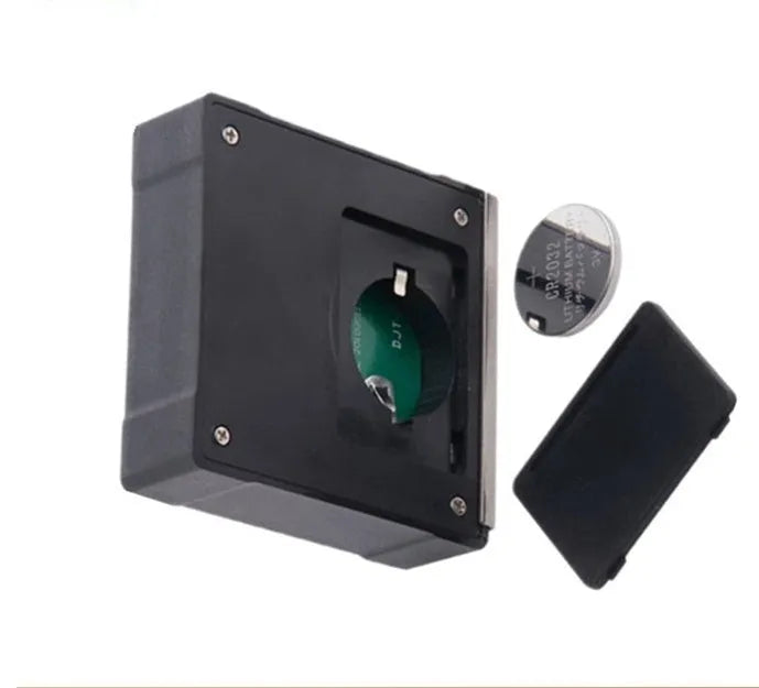 Mini magnetic angle inclinometer with digital display and magnetic base on metal surface