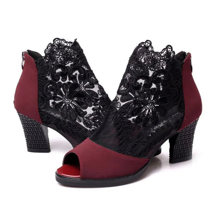 Women's black lace gladiator sandals with square high heels, floral patterns and peep toe design