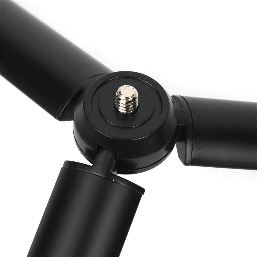 Black aluminium alloy mobile phone tripod and handheld stabilizer for Apple iPhone photography