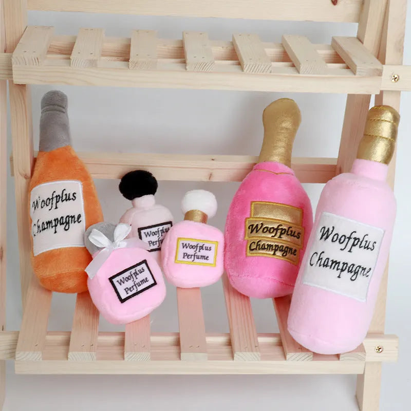 Plush wine bottle dog toy with squeaker in assorted colours