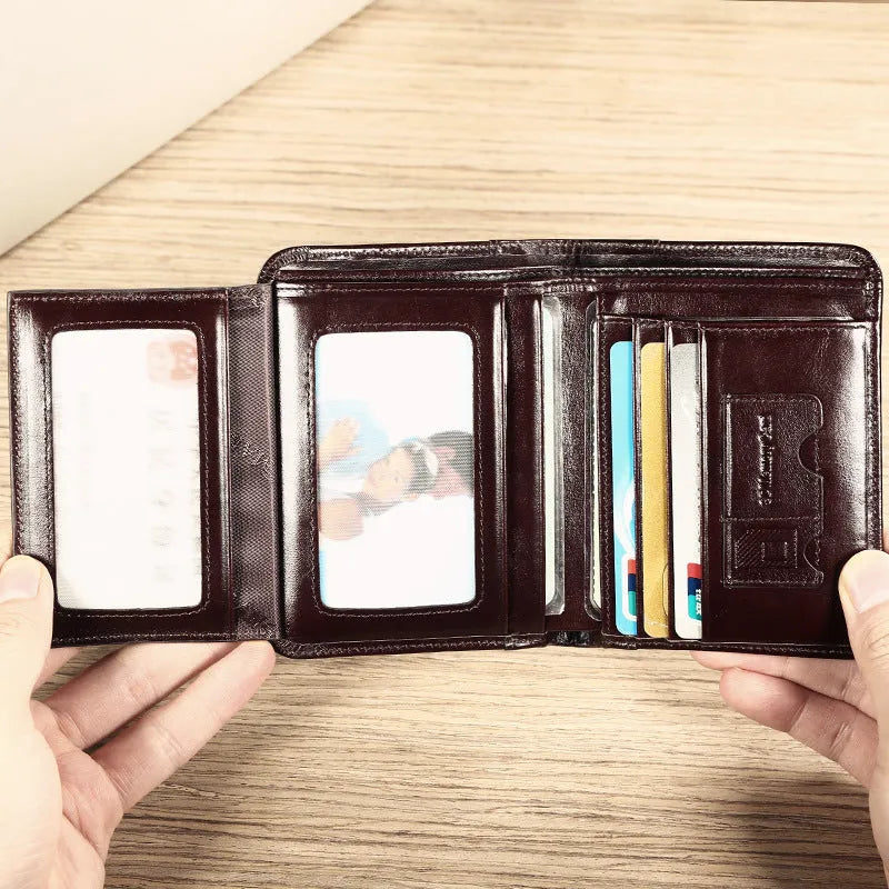 Men's black or brown leather wallet open to show photo window, card slots, and coin pocket.
