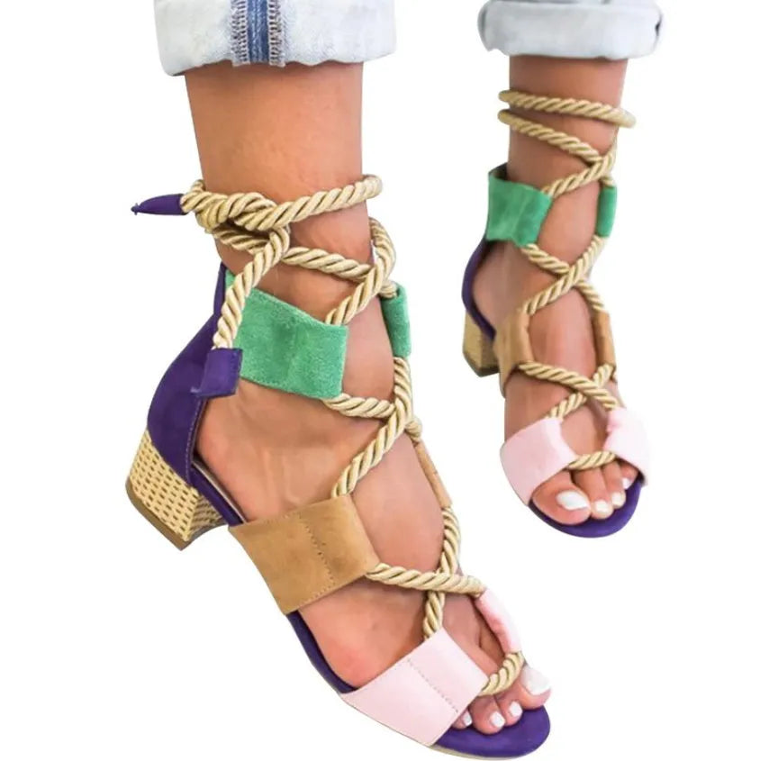 Women's suede ankle-strap sandals with thick round head and colour-matched design on a white background