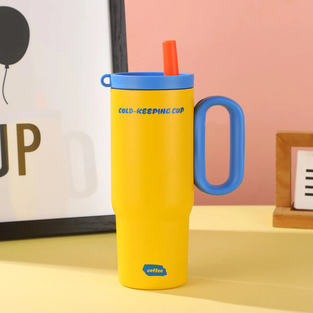 Portable insulated drink cup with carry handle and straw lid in multiple colours