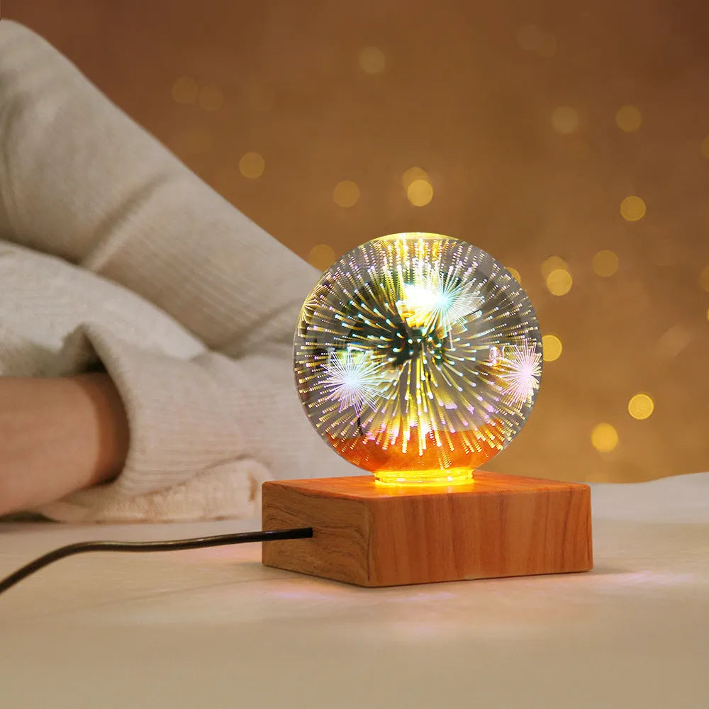 USB 3D firework crystal ball night light with touch control on a wooden table, warm LED glow effect