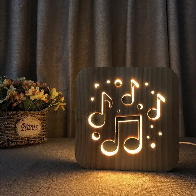 Pine wood cube LED atmosphere lamp with warm white light, showing USB cable and button switch.