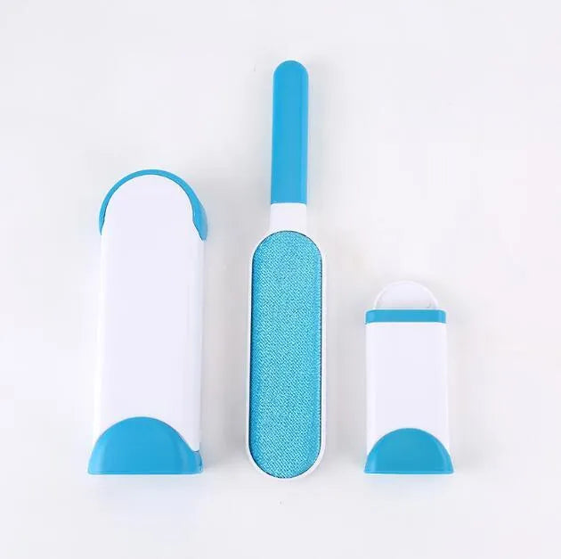 Blue reusable pet hair removal comb with a double-sided sticky brush head and a matching self-cleaning base.