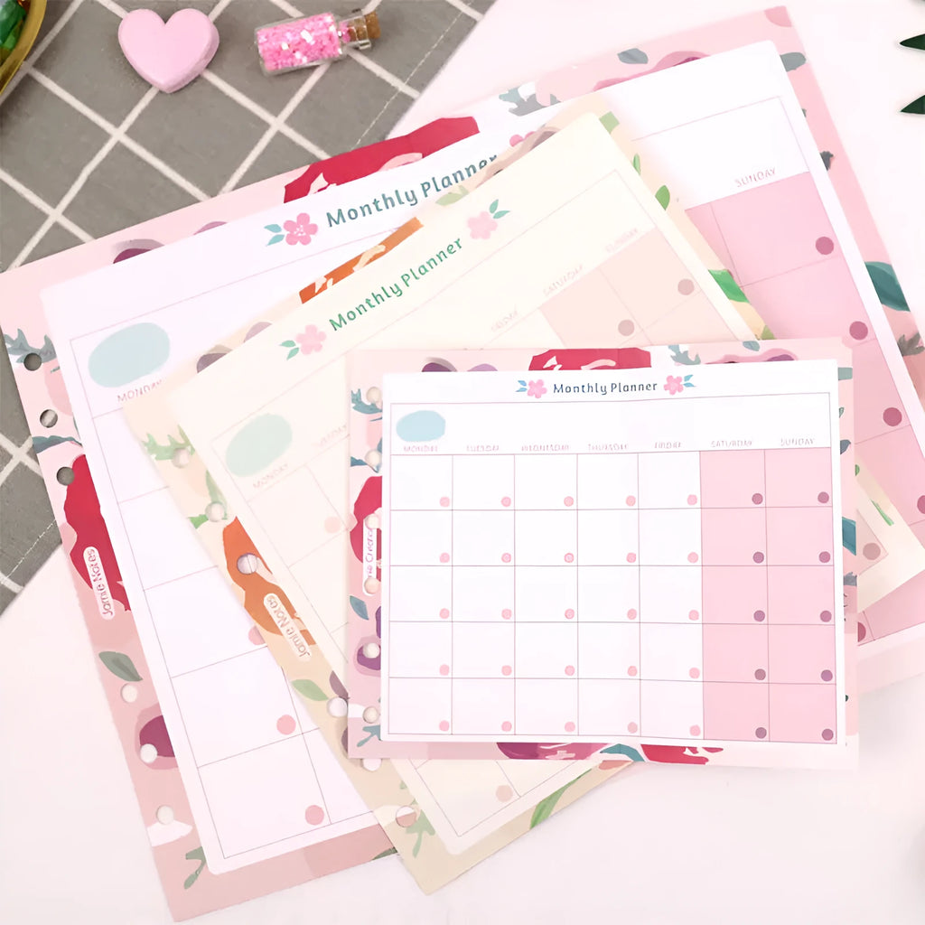 Loose-leaf refill inserts for A5 A6 A7 binders with floral monthly plan and Symphony tri-fold layouts, four colour options