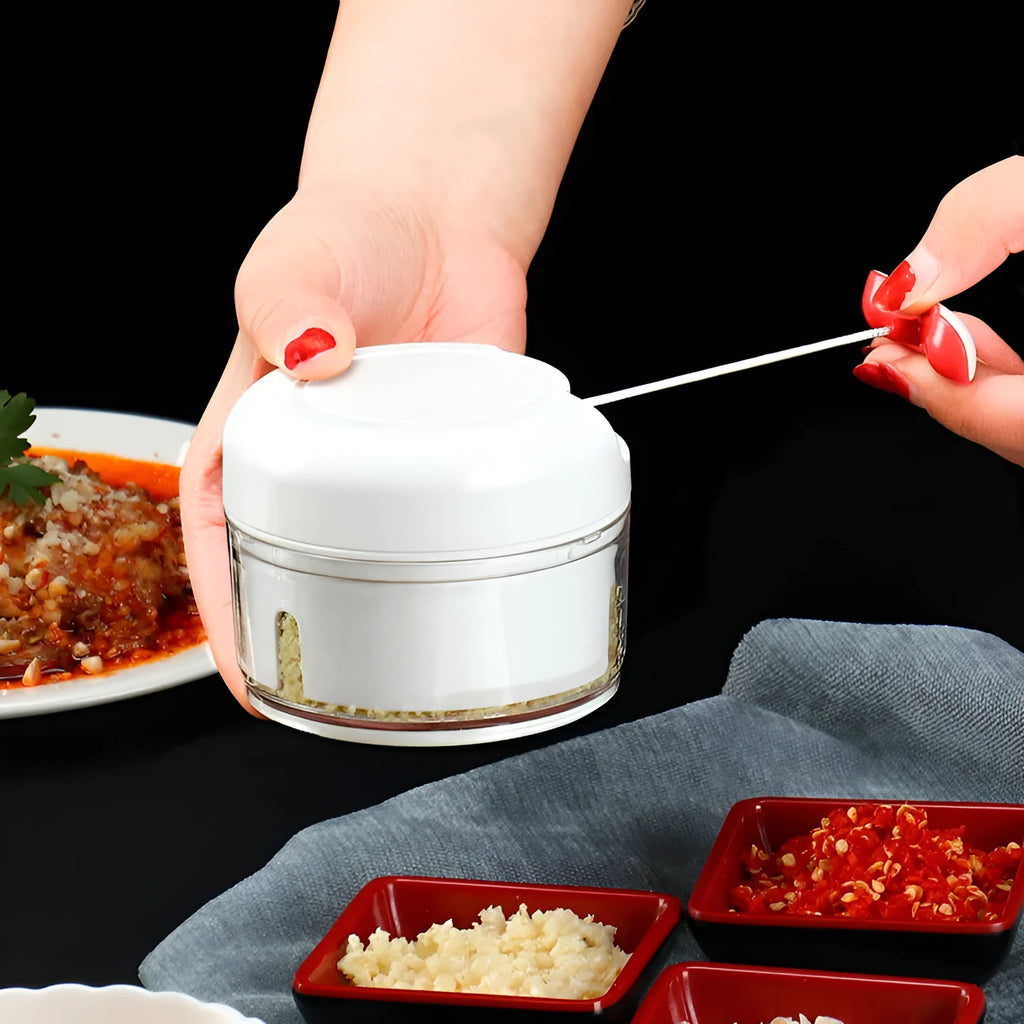 Manual cutting meat grinder with white plastic body and 304 stainless steel blade, compact size 8.5x7 cm