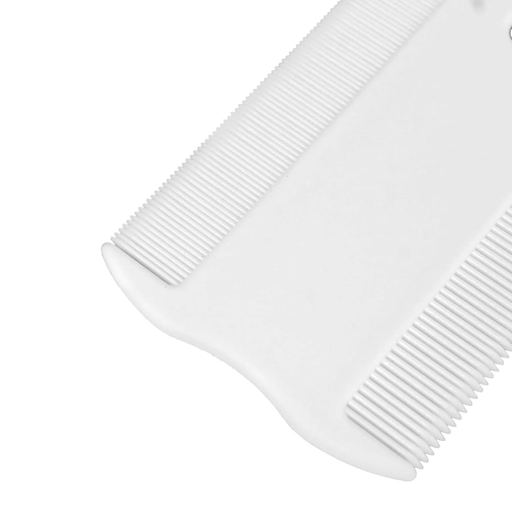A double-sided plastic flea comb for pets with dense teeth, shown next to a ruler indicating its 5 cm length.