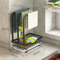 Foldable white plastic storage rack for draining kitchen cloths, shown in wall-mounted and desktop positions.