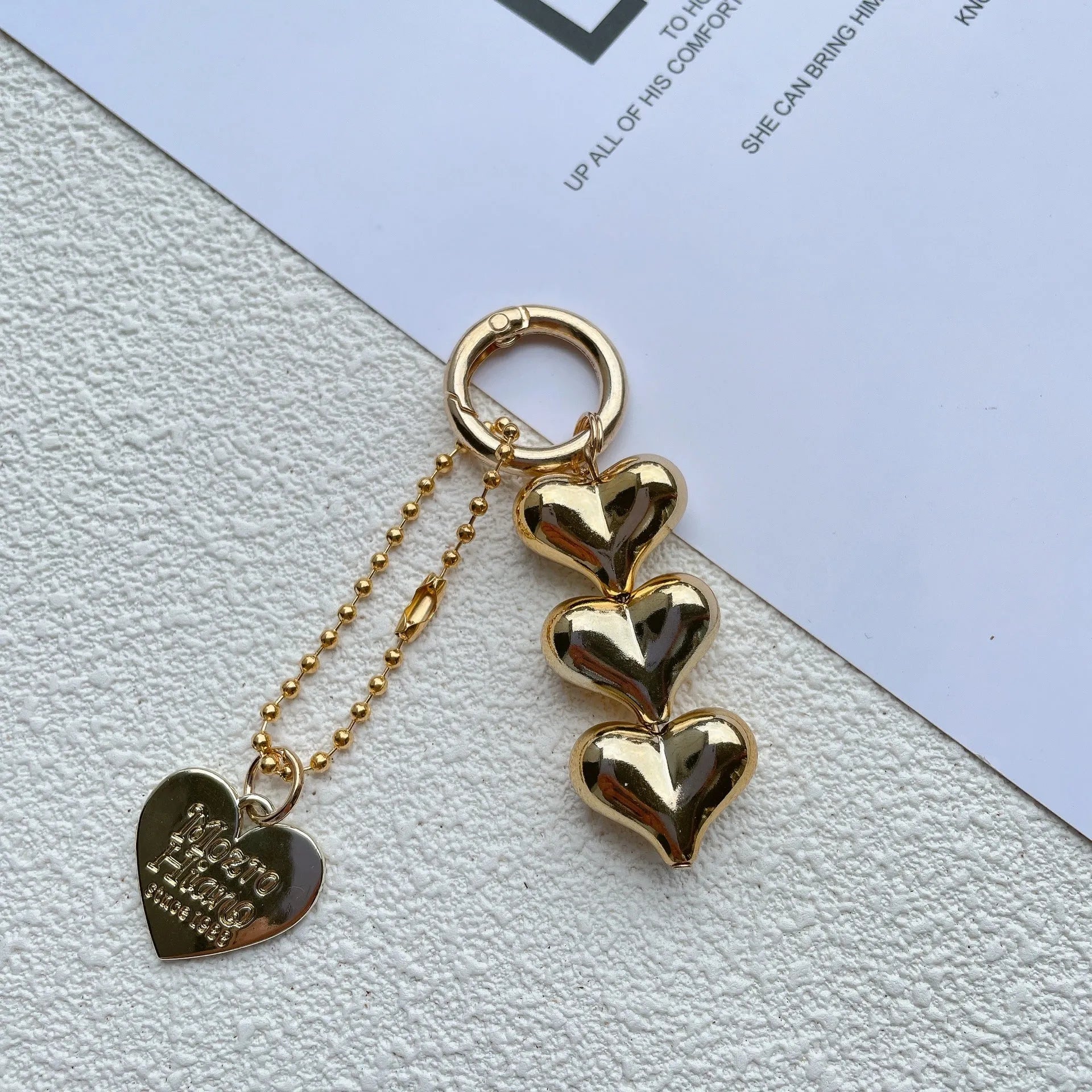 Acrylic Love Heart key ring with electroplated finish in metallic gold colour on a keychain