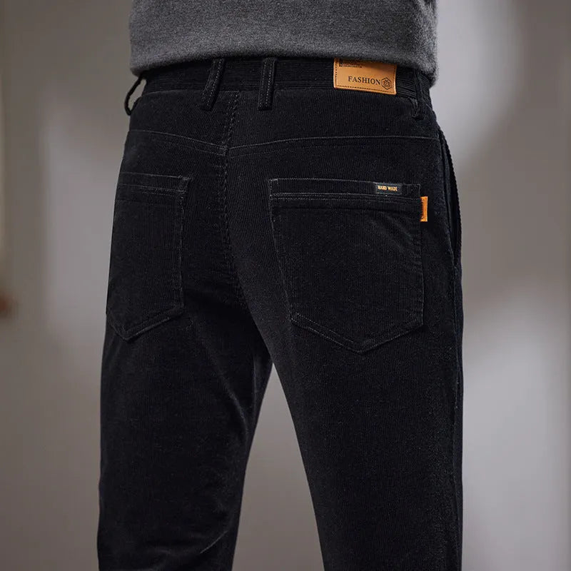 Slim fit straight corduroy trousers in black cotton fabric with mid waist, available in multiple sizes