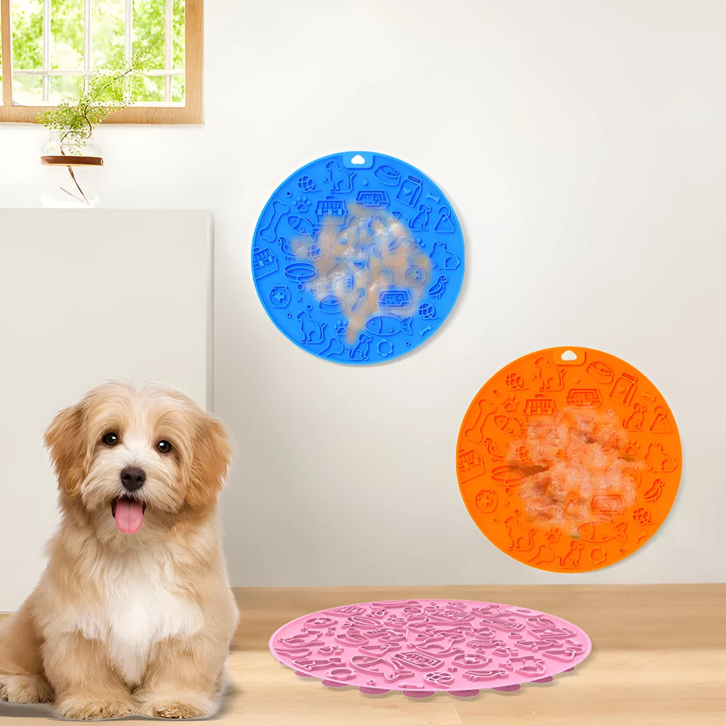 Round blue silicone pet licking mat with suction cups on a flat surface