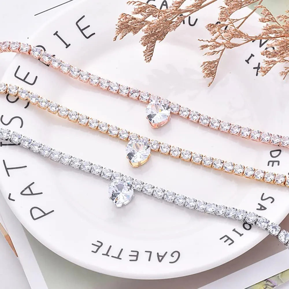 Pet collar with rhinestone heart design in gold, platinum, and rose gold colours on adjustable chain