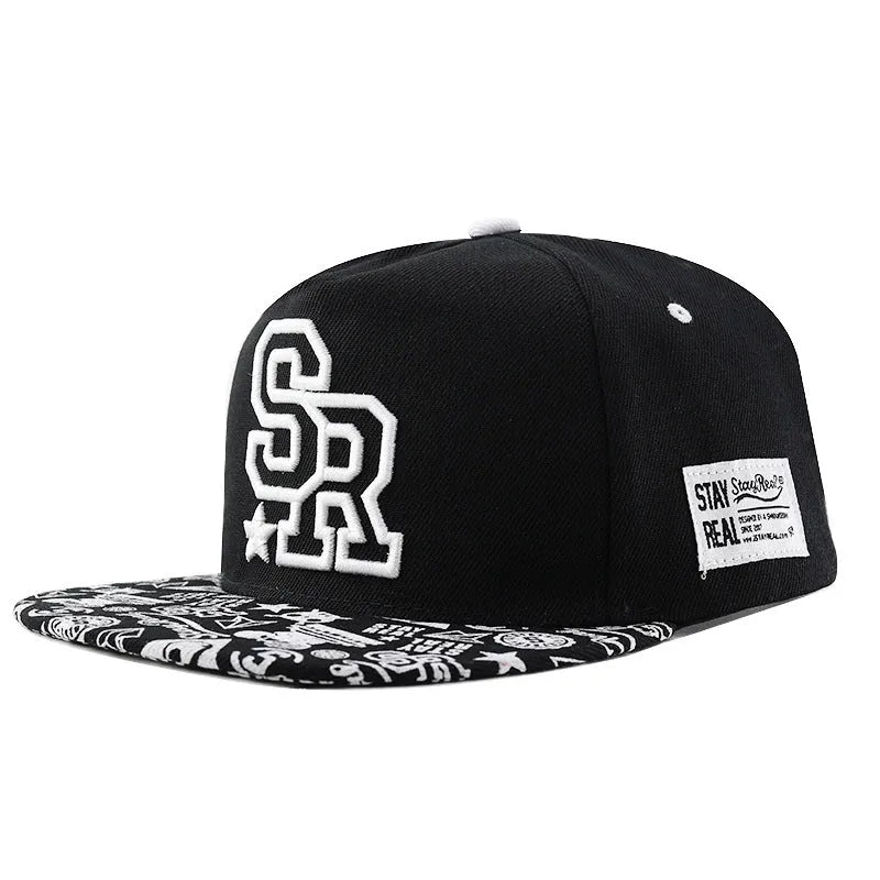 Cotton baseball cap with embroidered letters in black colour showing adjustable strap and dome crown