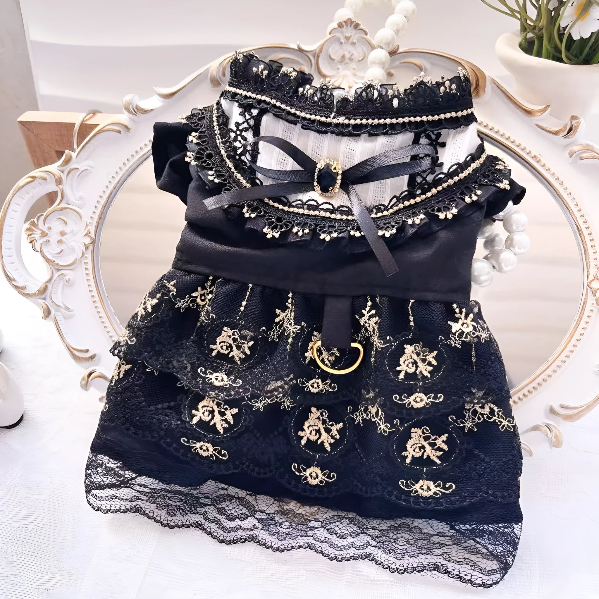 Golden Gothic princess-style skirt dress for a small dog or cat on a mannequin.
