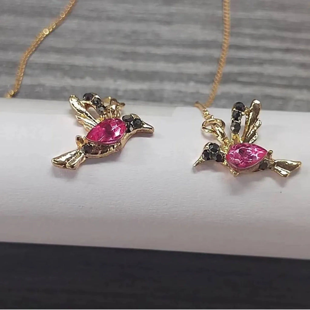 Women's long hanging earrings with bird charm design featuring zirconium wings in blue, red, and red lvzuan colour options