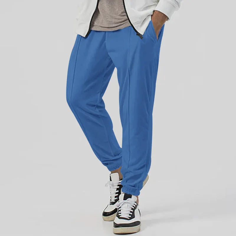 Men's straight-leg cotton blend track sweatpants in army green, shown laid flat.