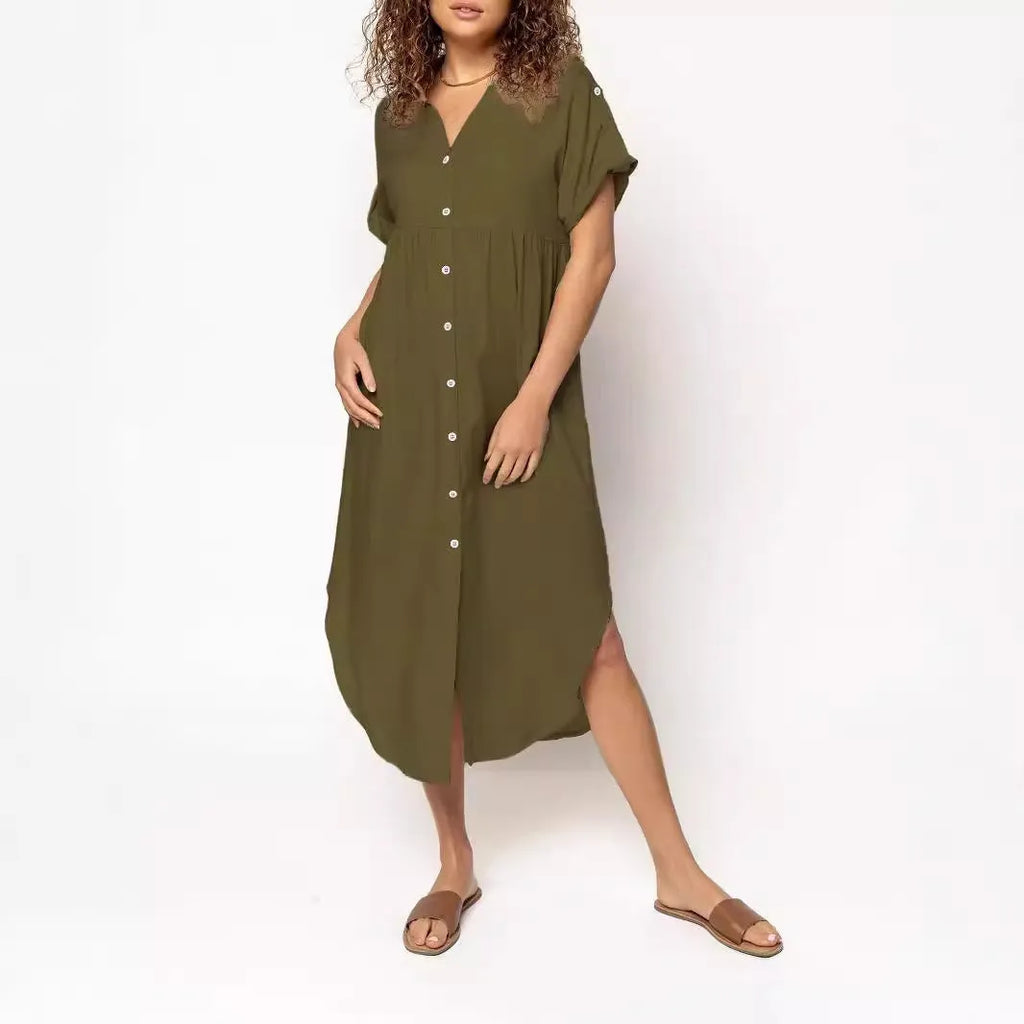 A loose-fitting, solid-colour button-down midi dress on a hanger, shown in apricot colour.
