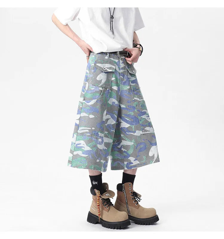 Men's camouflage cotton work trousers with straight leg and cropped length showing utility pockets
