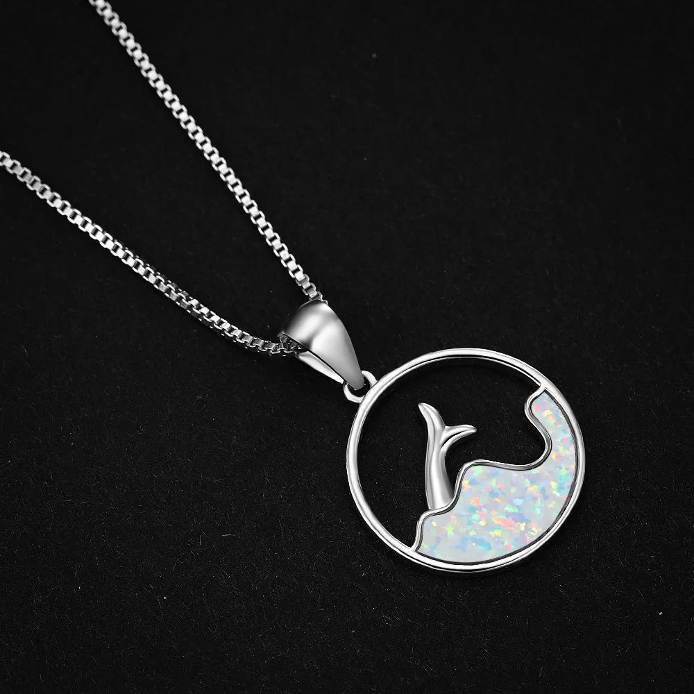 White gold electroplated copper fishtail necklace with geometric round pendant design