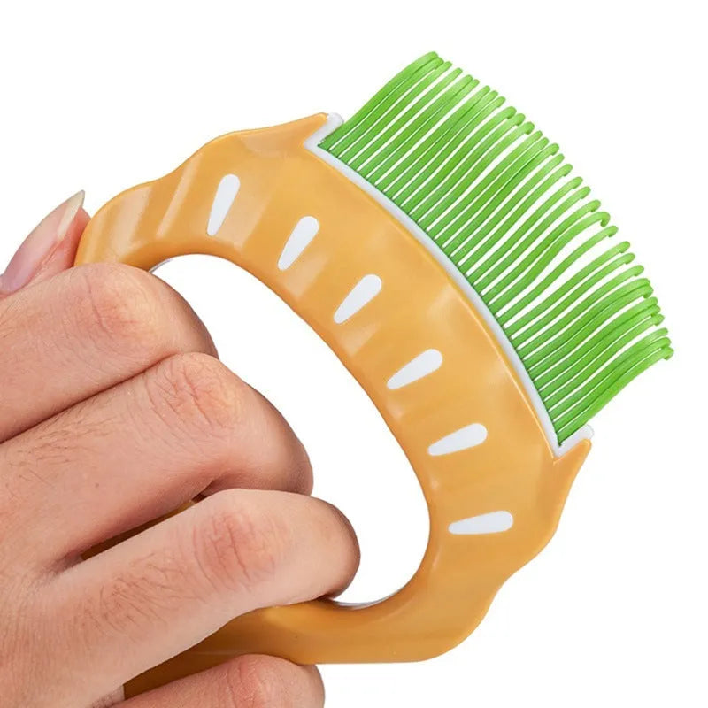 Shell-shaped plastic pet grooming brush with fine bent wire bristles in green colour