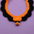 Hand crocheted wool pet collar in Bell Pumpkin colour on a cat, adjustable size for Halloween