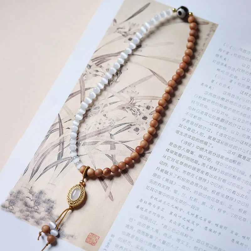 Barbie sandalwood double circle opal Tibetan bead bracelet with polished finish