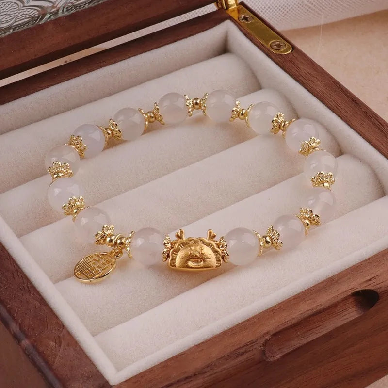 Women's floral glazed bracelet with zodiac animal design in glass and coloured glaze with electroplated finish
