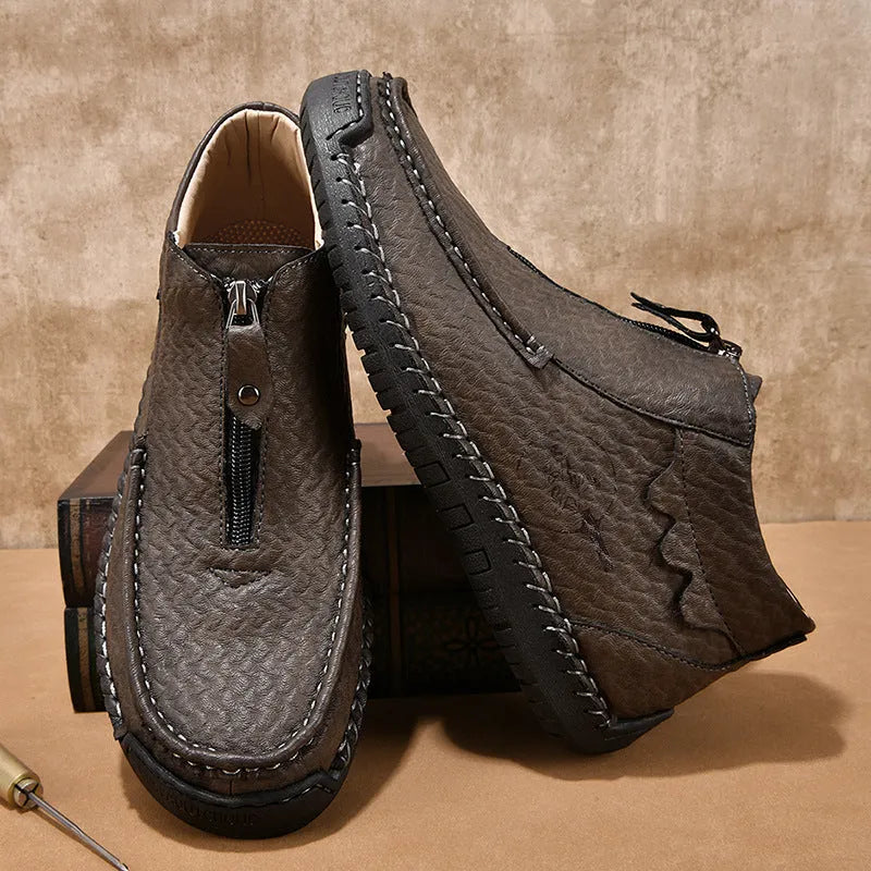 Men's black slip-on leather loafers with round toe and rubber sole
