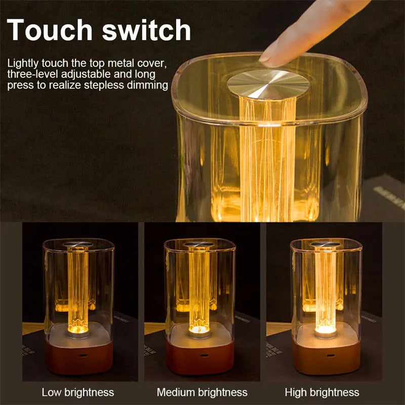 Rose gold LED touch atmosphere light with Auspicious Cloud pattern on a bedside table, USB charging cable included