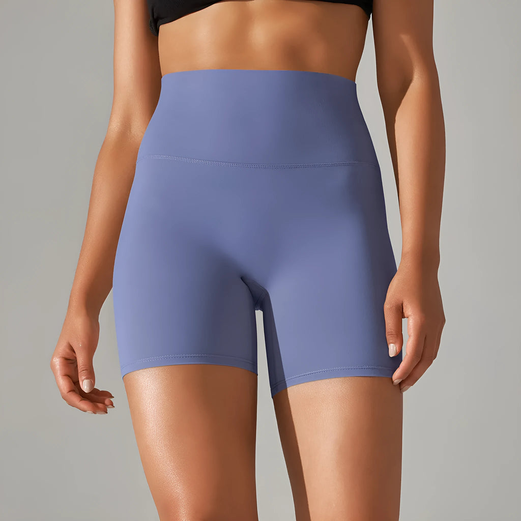 High waist hip lift fitness pants for women in black with belly control and moisture wicking