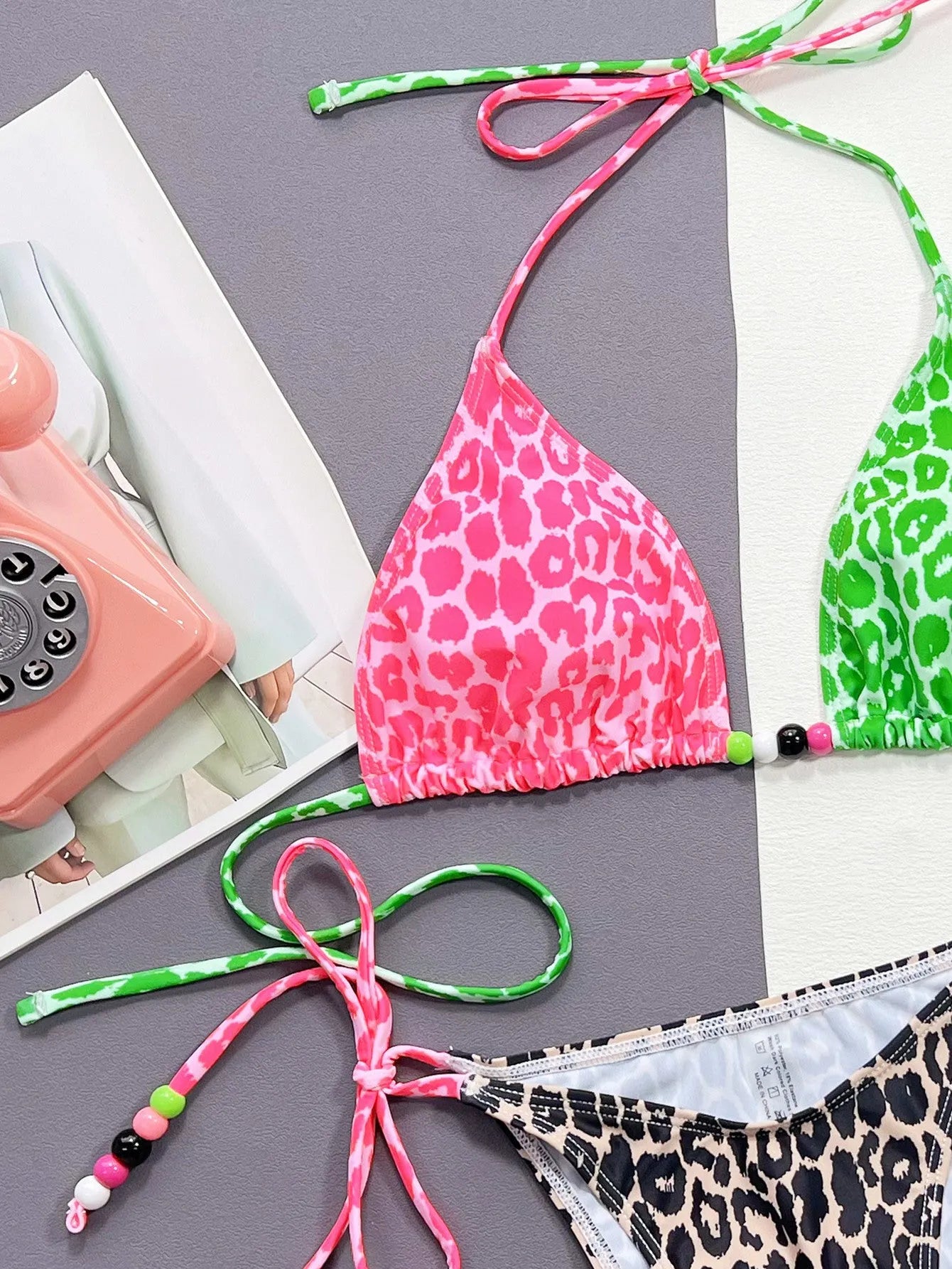 Women's leopard print bikini set with bra and brief panties in polyester and spandex lining
